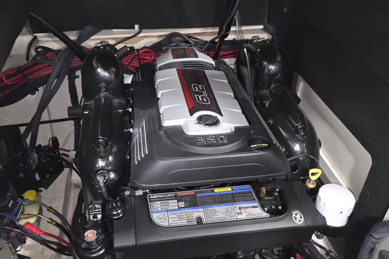 Slide: The Image of Engine compartment of a 2017 Sea Ray SLX 280 boat, featuring a Mercury 6.2L engine. - 11