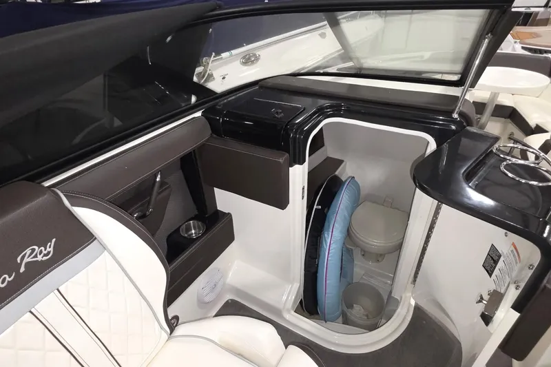 Slide: The Image of Interior of 2017 Sea Ray SLX 280 boat featuring a compact restroom area. - 6