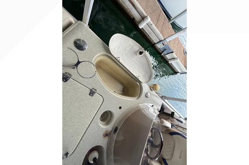 Slide: The Image of 2007 South Bay 925CR TT I/O boat interior with steering wheel and seating. - 15