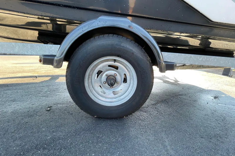 Slide: The Image of 2019 Yamaha Boats SX195 interior with sleek seating and modern design. - 12