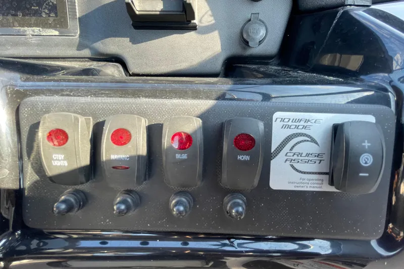 Slide: The Image of 2019 Yamaha Boats SX195 interior with modern seating and steering console. - 22