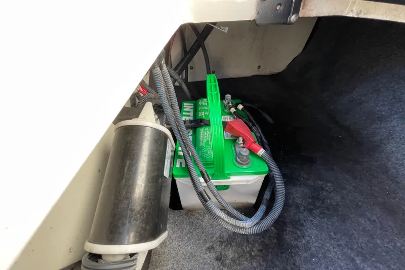 Slide: The Image of 2019 Yamaha Boats SX195 interior seating with speaker and cup holder. - 51