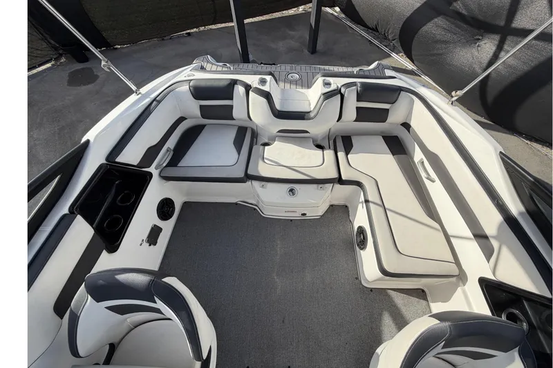 Slide: The Image of 2019 Yamaha Boats SX195 interior with spacious seating and modern design. - 68