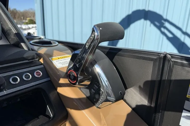 Slide: The Image of Control panel of 2026 Godfrey Monaco 235 SFLC iMPACT boat, featuring throttle and buttons. - 20