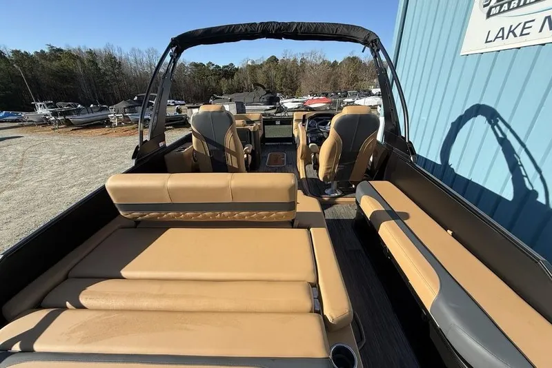 Slide: The Image of 2026 Godfrey Monaco 235 SFLC iMPACT boat interior with tan seating and modern design. - 30