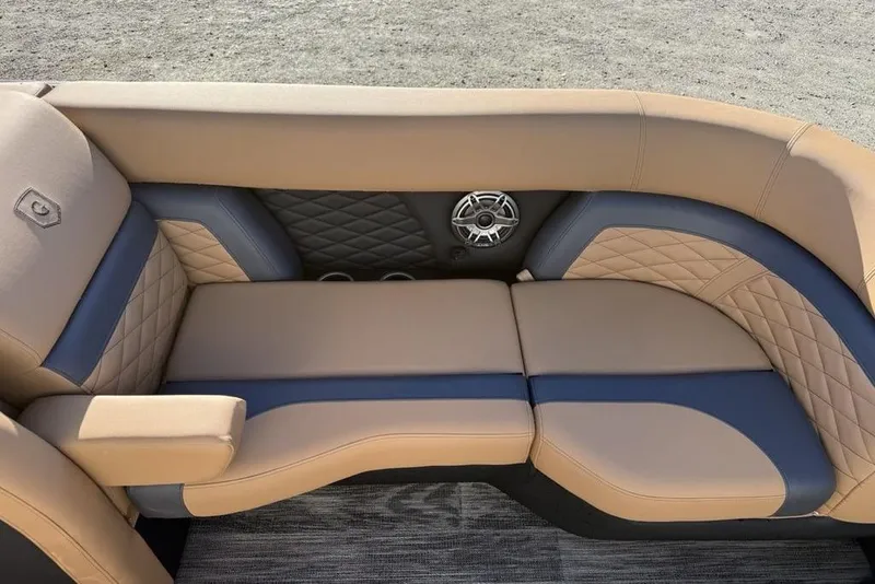 Slide: The Image of Luxurious seating on 2026 Godfrey Monaco 235 SFLC iMPACT boat, featuring tan and blue upholstery. - 34