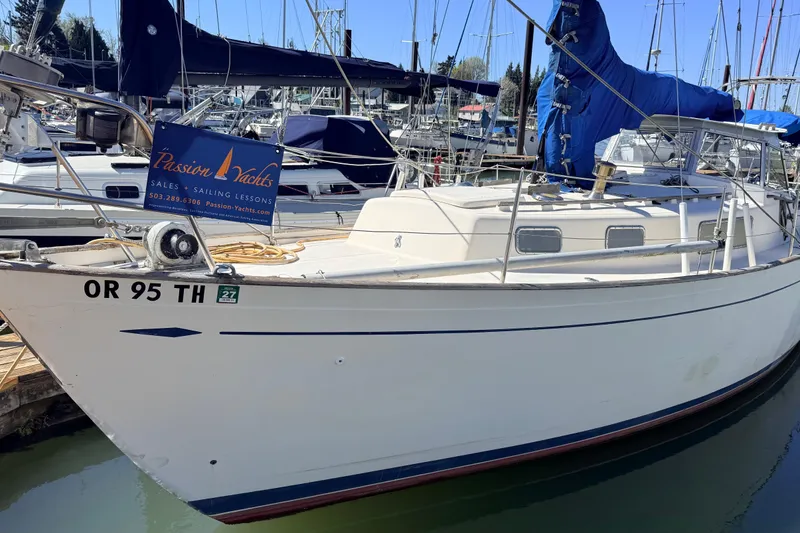 The Image of 1974 Hallberg-Rassy Rasmus 35 sailboat docked at marina with Passion Yachts sign. - 0