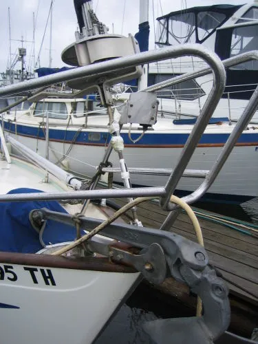 Slide: The Image of Bow of a 1974 Hallberg-Rassy Rasmus 35 sailboat in harbor. - 14