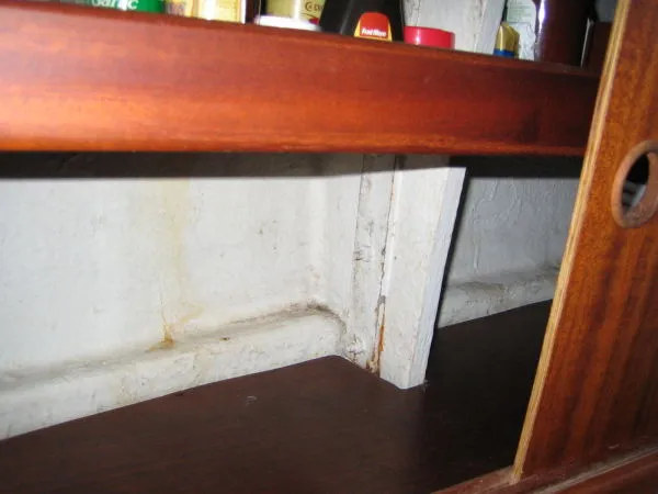 Slide: The Image of Interior of a 1974 Hallberg-Rassy Rasmus 35 with wooden shelf. - 25