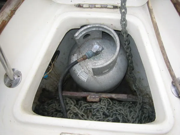 Slide: The Image of Propane tank and chain in storage compartment of 1974 Hallberg-Rassy Rasmus 35. - 28