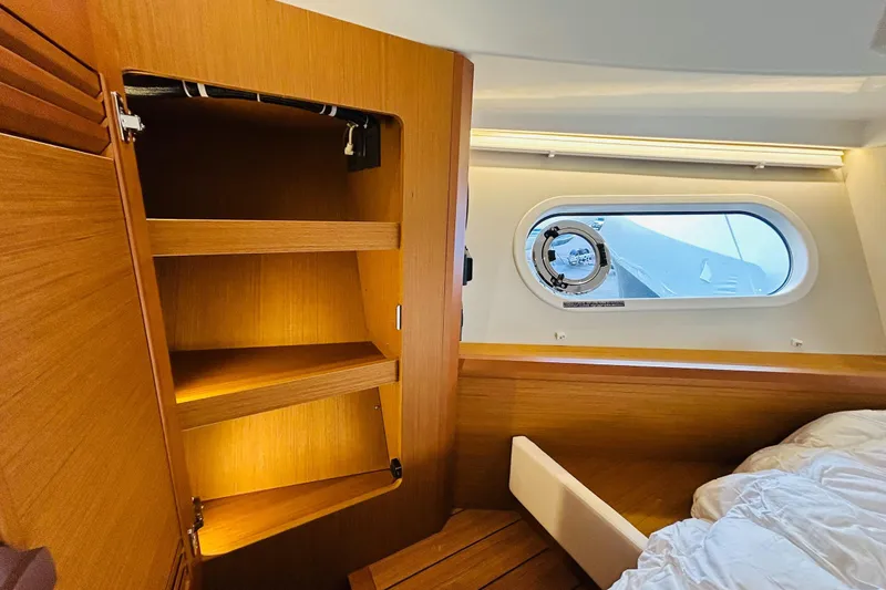 Slide: The Image of Port side locker of main cabin - 16