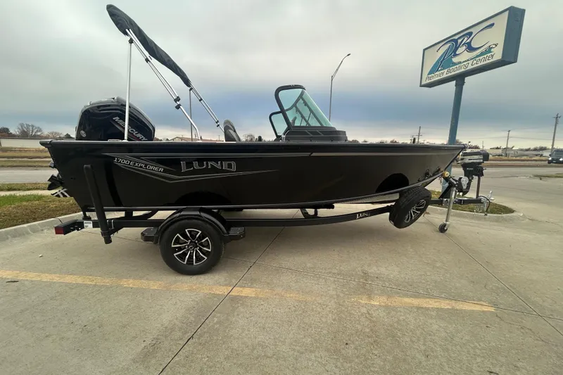 Slide: The Image of 2026 Lund 1700 Explorer Sport boat on trailer at Premier Boating Center. - 0
