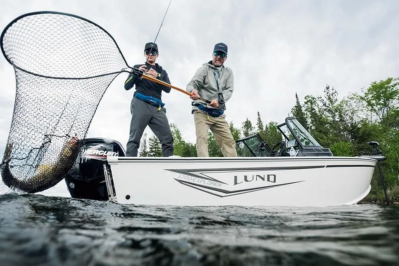 Slide: The Image of Manufacturer Provided Image: Two people fishing on a 2026 Lund 1700 Explorer Sport boat. - 38