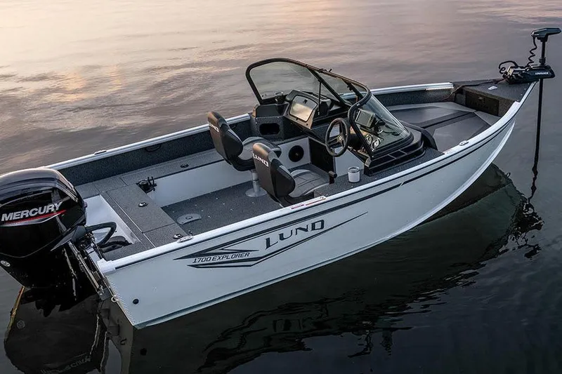 Slide: The Image of Manufacturer Provided Image: 2026 Lund 1700 Explorer Sport boat on calm water at sunset. - 39