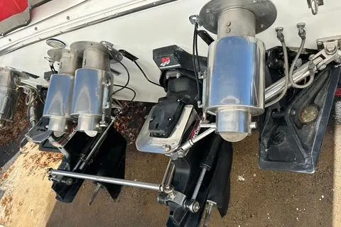 Slide: The Image of 1989 Cigarette Cafe Racer 35 boat engines and exhaust system close-up. - 7