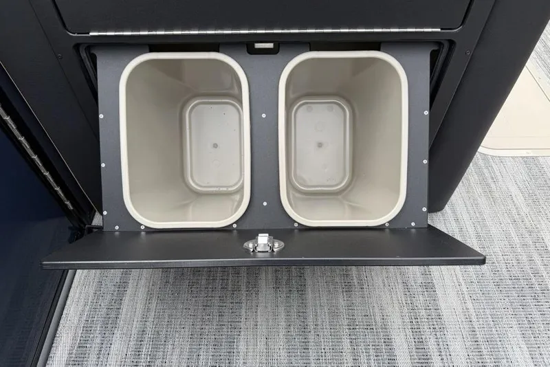 Slide: The Image of Dual storage compartments in 2026 Godfrey Monaco 235 SFLC iMPACT boat. - 17