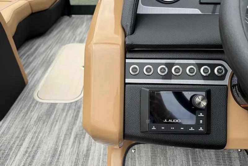 Slide: The Image of 2026 Godfrey Monaco 235 SFLC iMPACT dashboard with JL Audio system and control buttons. - 18