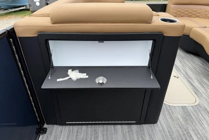Slide: The Image of Interior view of 2026 Godfrey Monaco 235 SFLC iMPACT boat with storage compartment. - 19