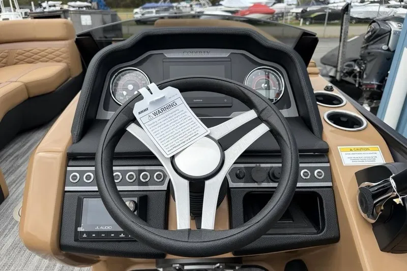 Slide: The Image of Steering console of 2026 Godfrey Monaco 235 SFLC iMPACT boat with gauges and controls. - 20