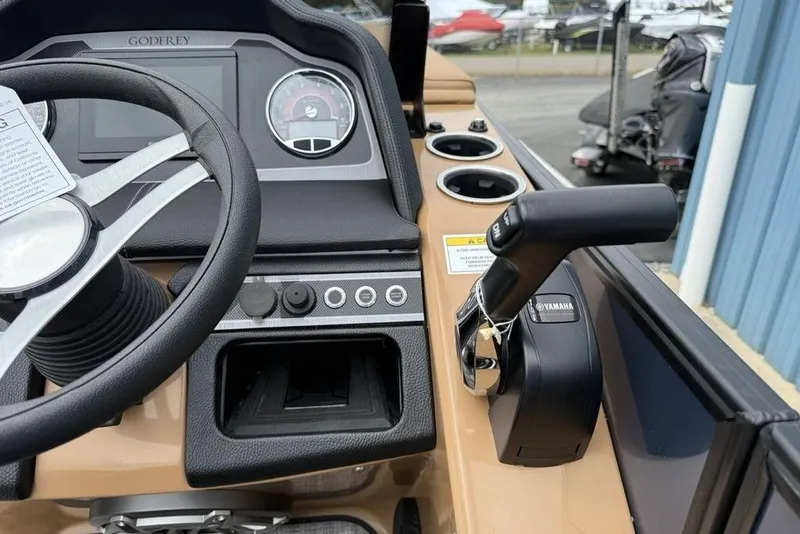 Slide: The Image of Control panel of 2026 Godfrey Monaco 235 SFLC iMPACT boat with Yamaha throttle. - 25