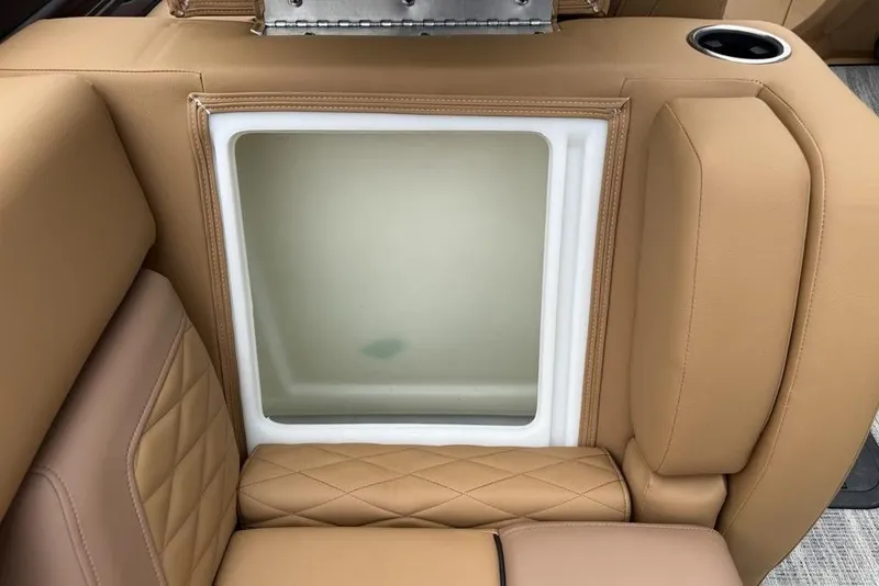 Slide: The Image of Luxurious tan seating on 2026 Godfrey Monaco 235 SFLC iMPACT boat, featuring integrated storage. - 30