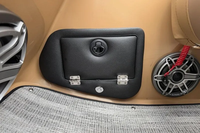 Slide: The Image of Interior of 2026 Godfrey Monaco 235 SFLC iMPACT with speaker and storage compartment. - 33