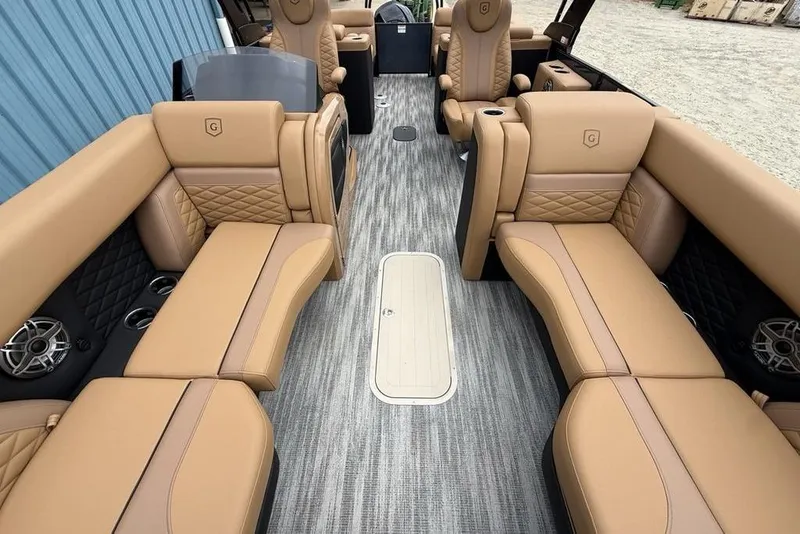 Slide: The Image of Luxurious interior of 2026 Godfrey Monaco 235 SFLC iMPACT pontoon boat with tan seating. - 37