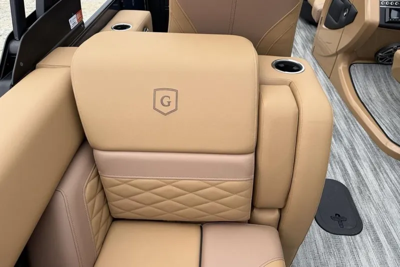 Slide: The Image of Luxurious tan seating in 2026 Godfrey Monaco 235 SFLC iMPACT boat interior. - 39