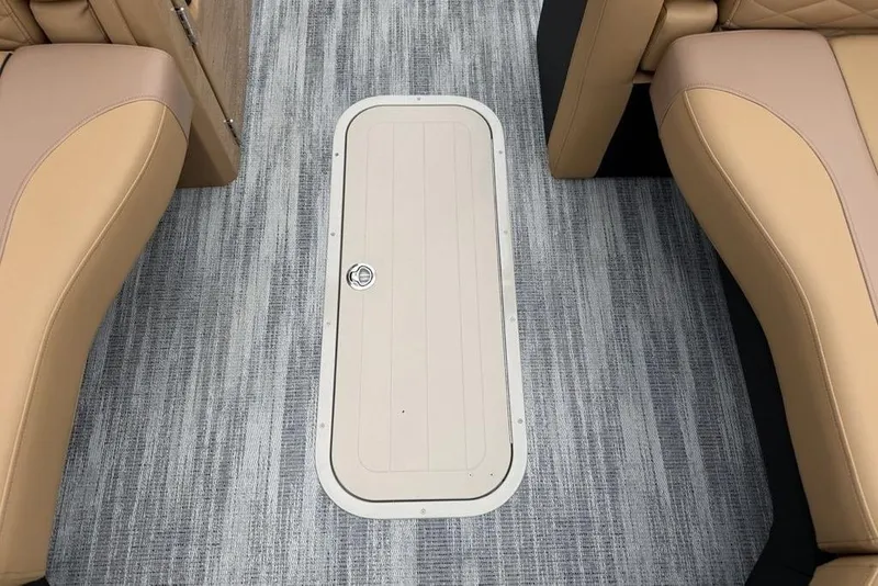 Slide: The Image of Interior view of 2026 Godfrey Monaco 235 SFLC iMPACT boat with beige seating and floor hatch. - 40