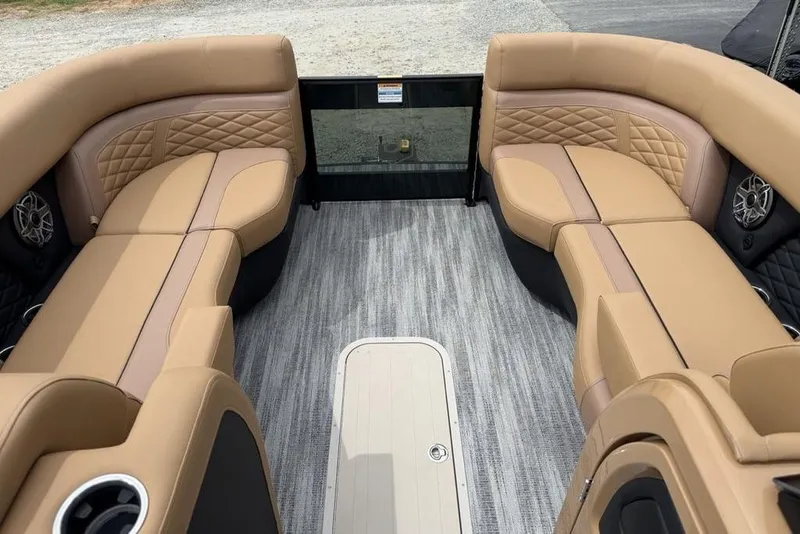 Slide: The Image of Luxurious interior of 2026 Godfrey Monaco 235 SFLC iMPACT pontoon boat with tan seating. - 9