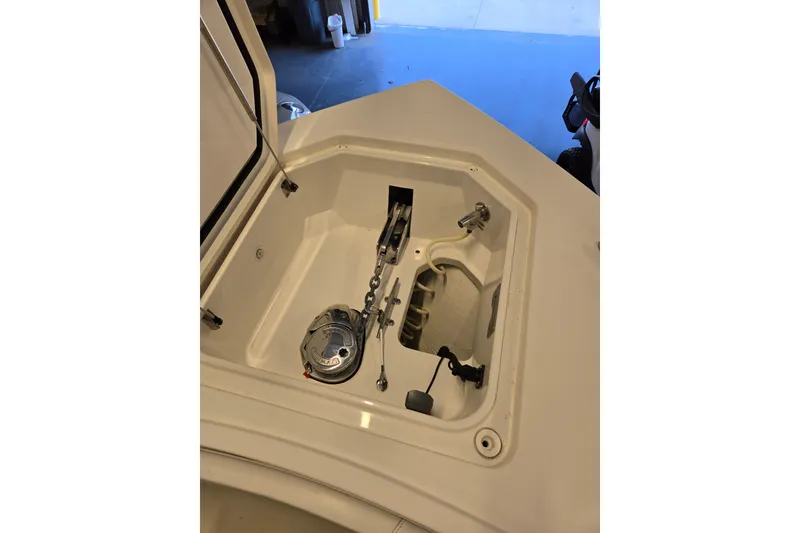 Slide: The Image of Anchor compartment of 2020 Regulator 41 boat, featuring chain and winch system. - 45