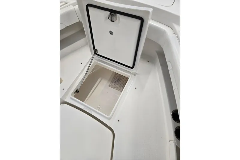 Slide: The Image of Open storage compartment on 2020 Regulator 41 boat deck. - 46