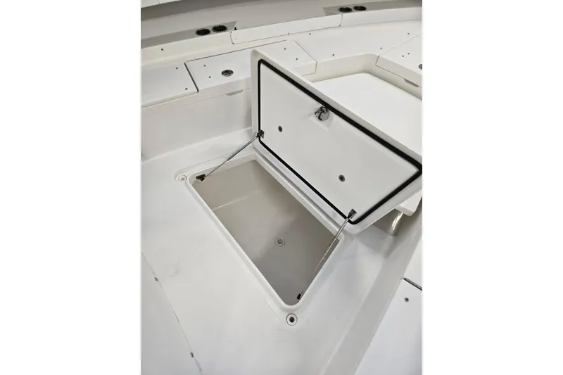 Slide: The Image of Open storage compartment on 2020 Regulator 41 boat deck. - 50