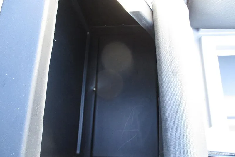 Slide: The Image of Storage compartment in 2026 Bentley Pontoons Legacy 243 Navigator boat interior. - 12