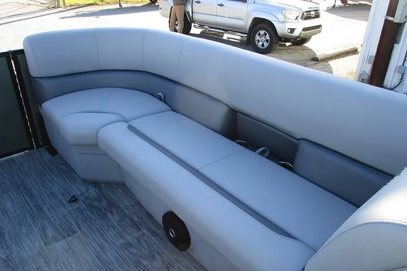 Slide: The Image of 2026 Bentley Pontoons Legacy 243 Navigator with luxurious gray seating and modern design. - 13