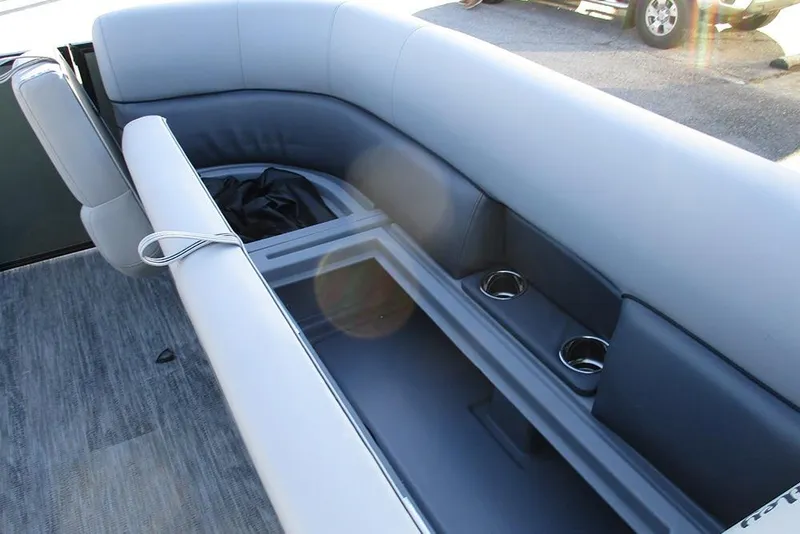 Slide: The Image of 2026 Bentley Pontoons Legacy 243 Navigator interior seating with cup holders. - 14