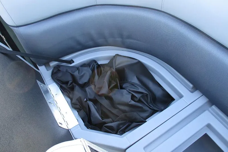 Slide: The Image of Storage compartment in 2026 Bentley Pontoons Legacy 243 Navigator boat. - 16