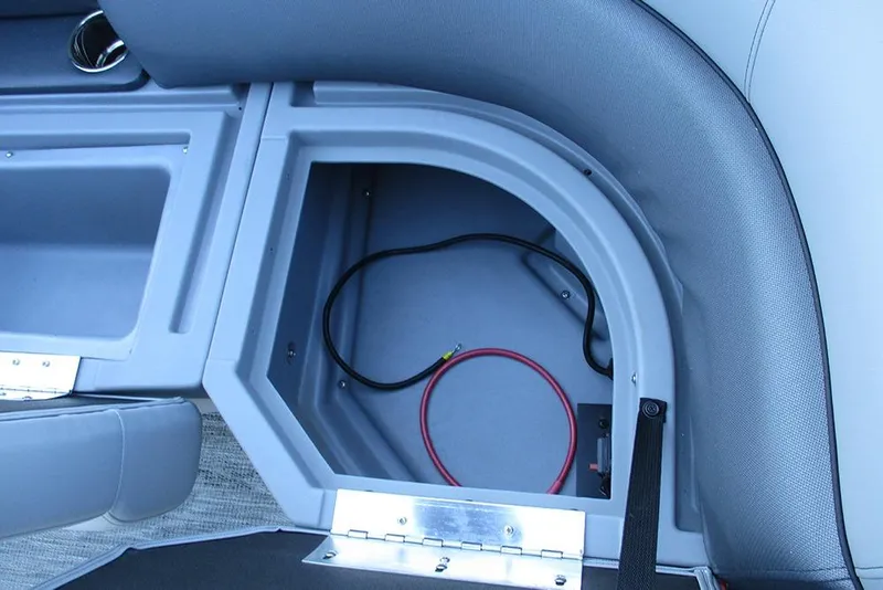 Slide: The Image of Open storage compartment in 2026 Bentley Pontoons Legacy 243 Navigator boat. - 21