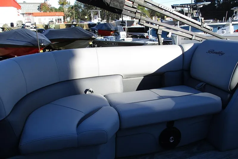 Slide: The Image of 2026 Bentley Pontoons Legacy 243 Navigator interior seating, luxurious and spacious design. - 24