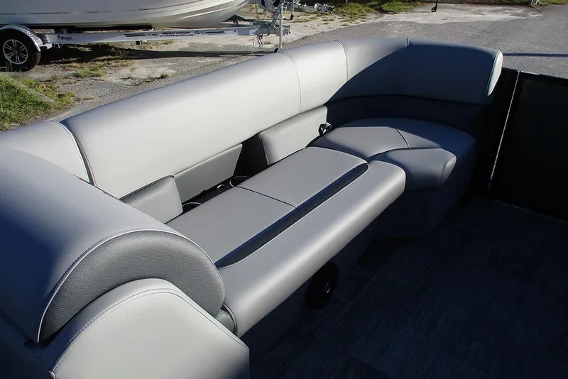 Slide: The Image of 2026 Bentley Pontoons Legacy 243 Navigator interior with luxurious gray seating. - 8