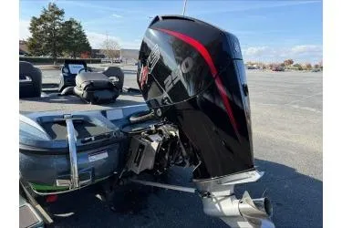 Slide: The Image of 2019 Nitro Z21 boat with powerful outboard motor in a parking lot. - 4