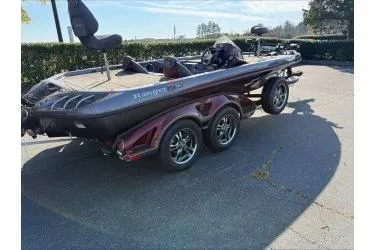 Slide: The Image of 2015 Ranger 521C boat with dual axles parked outdoors. - 3