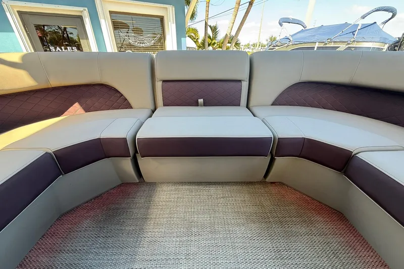 Slide: The Image of Luxurious seating on 2025 Bennington 23 LPD pontoon boat, featuring elegant upholstery design. - 15