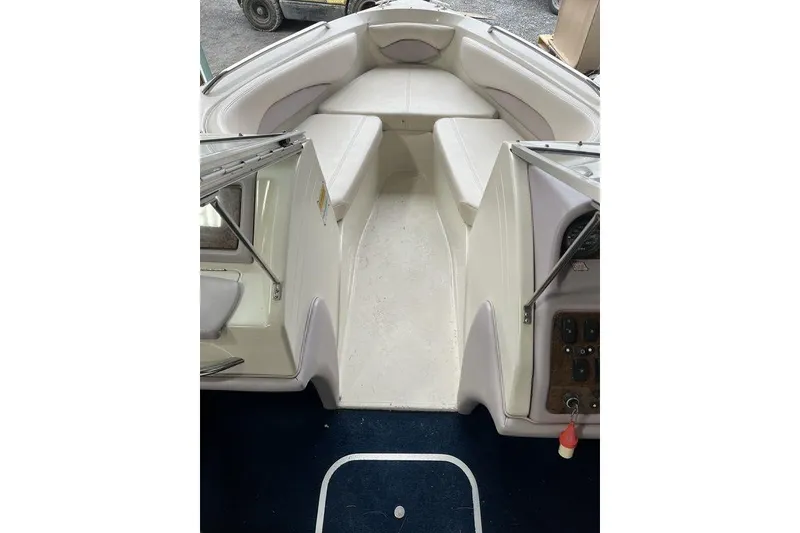 Slide: The Image of 1997 Regal Valanti 200 boat with corroded outboard motor in a garage. - 27