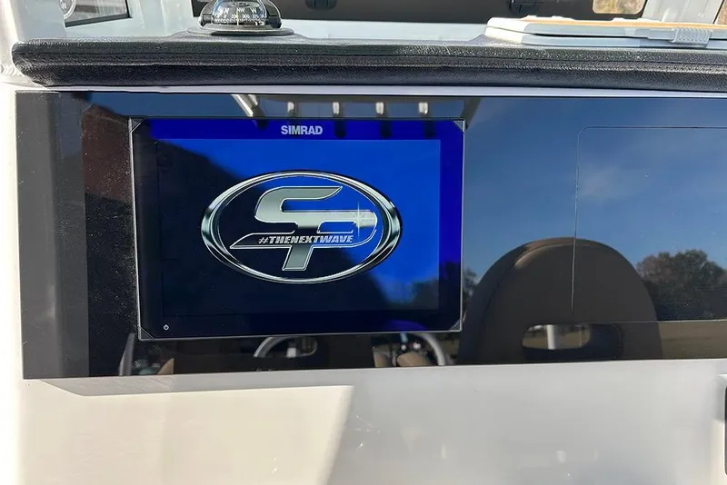 Slide: The Image of Simrad display on 2026 Sea Pro 245FLX Sandbar boat dashboard. - 22