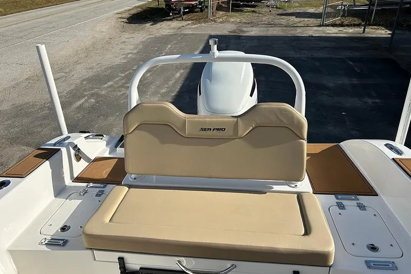 Slide: The Image of 2026 Sea Pro 245FLX Sandbar boat with beige seating and sleek design. - 24