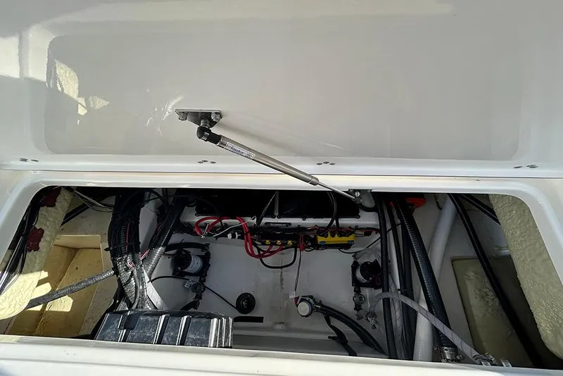 Slide: The Image of 2026 Sea Pro 245FLX Sandbar boat interior wiring and components view. - 26