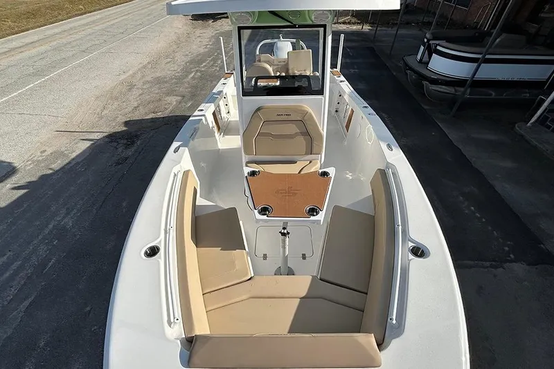 Slide: The Image of 2026 Sea Pro 245FLX Sandbar boat with spacious seating and modern design. - 32