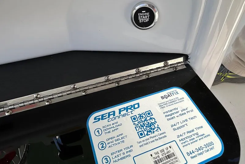 Slide: The Image of 2026 Sea Pro 245FLX Sandbar boat with engine start button and Sea Pro Connect instructions. - 42