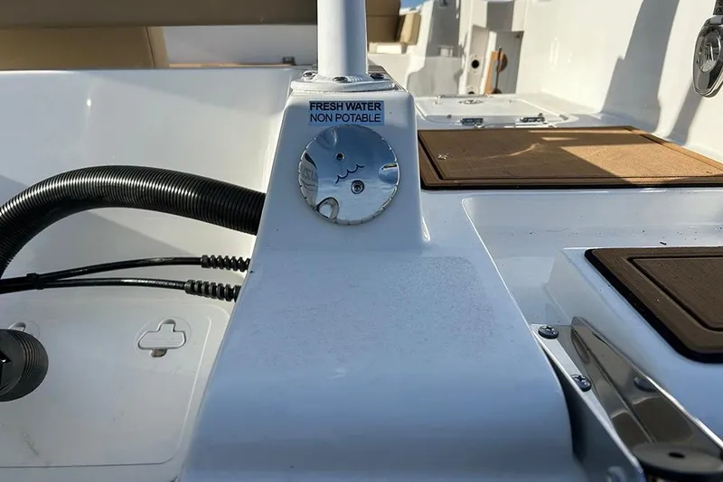 Slide: The Image of 2026 Sea Pro 245FLX Sandbar boat detail showing non-potable fresh water access. - 43